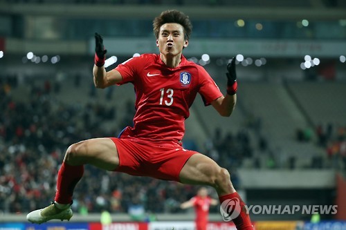 Koo Ja-cheol of South Korea celebrates his go-ahead goal in the team's 2-1 victory over Uzbekistan in their World Cup qualifier at Seoul World Cup Stadium on Nov. 15, 2016. 