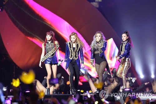 This file photo, provided by CJ E&M, shows South Korean girl group 2NE1 perform during the 2015 Mnet Asian Music Awards in Hong Kong on Dec. 2, 2015. After 2NE1's youngest member Gong Minzy left the group in April, 2016, the K-pop band confronted disbandment rumors ever since.