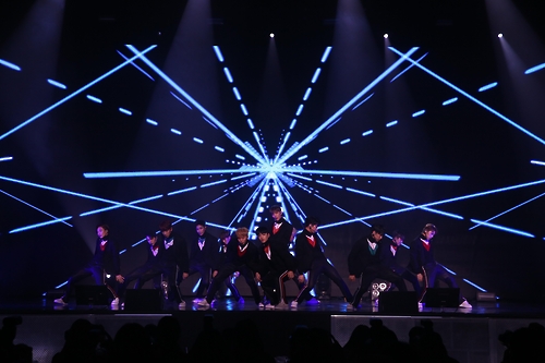 The photo, provided by Pledis Entertainment, shows South Korean boy band Seventeen showcasing dance-pop song "Boom Boom," the lead single of its third and latest EP "Going Seventeen," in central Seoul on Dec. 5, 2016.