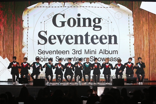 The photo, provided by Pledis Entertainment, shows South Korean boy band Seventeen attending a press conference for its third and latest EP "Going Seventeen" in central Seoul on Dec. 5, 2016. 