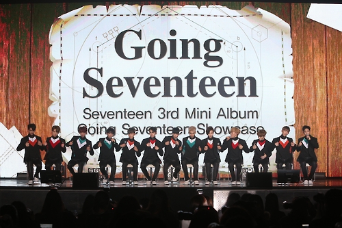 The photo, provided by Pledis Entertainment, shows South Korean boy band Seventeen attending a press conference for its third and latest EP "Going Seventeen" in central Seoul on Dec. 5, 2016.