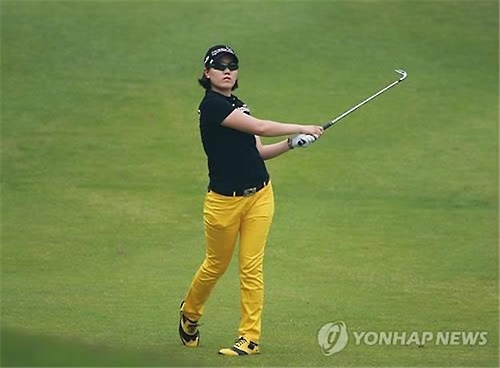 In this file photo provided by the Korea LPGA Tour, Lee Jeong-eun hits a shot during the second round of the E1 Charity Open at South Springs Country Club in Icheon, Gyeonggi Province, on June 1, 2013.