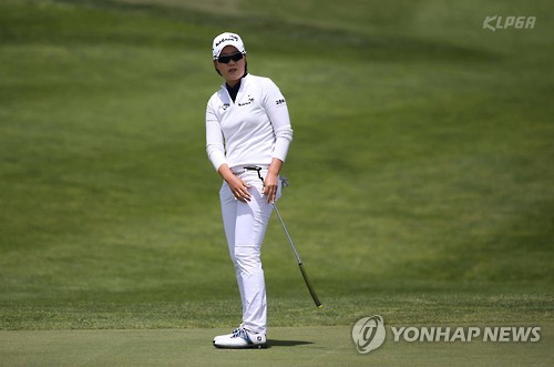 In this file photo provided by the KLPGA Tour, Lee Jeong-eun watches her putt during the third round of Kyochon Honey Ladies Open at Gunsan Golf & Country Club in Gunsan, North Jeolla Province, on May 7, 2016. 