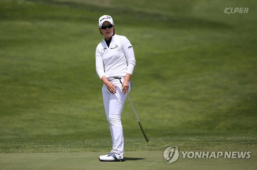 In this file photo provided by the KLPGA Tour, Lee Jeong-eun watches her putt during the third round of Kyochon Honey Ladies Open at Gunsan Golf & Country Club in Gunsan, North Jeolla Province, on May 7, 2016.