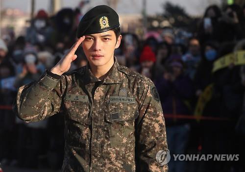 This photo shows Jaejoong of boy group JYJ saluting fans and reporters after being discharged from his mandatory military service on Dec. 30, 2016