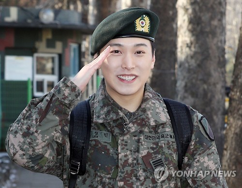 This photo shows Super Junior's Sungmin saluting fans and reporters after being discharged from his mandatory military service on Dec. 30, 2016. 
