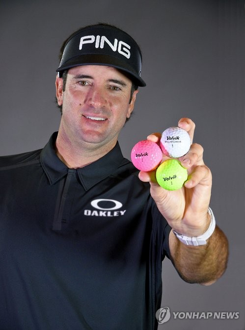 In this promotional photo provided by South Korean ball manufacturer Volvik on Jan. 3, 2017, PGA Tour star Bubba Watson, a two-time Masters champion, holds up Volvik balls that he will be playing in 2017.