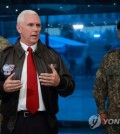 U.S. Vice President Mike Pence (C) speaks during his visit to the inter-Korean border village of Panmunjom within the Demilitarized Zone separating the two Koreas on April 17, 2017. (Pool photo) (Yonhap)