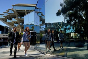 Students at the University of California, San Diego, where an organization of Chinese students is protesting the invitation of the Dalai Lama as a commencement speaker. Credit Sandy Huffaker for The New York Times