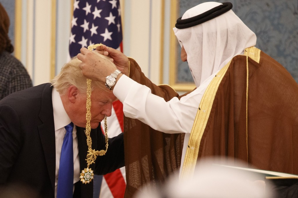 Saudi King Salman bin Abdul Aziz presents President Trump with his nation’s highest civilian honor. (Evan Vucci/Associated Press)