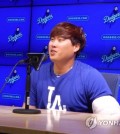 Los Angeles Dodgers pitcher Ryu Hyun-jin speaks in a press conference after winning a Major League Baseball game against the Philadelphia Phillies at Dodger Stadium in Los Angeles on April 30, 2017. (Yonhap)
