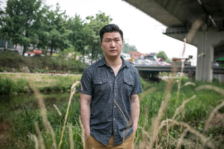 Adam Crapser near his home in Seoul. He is one of at least half a dozen adoptees in South Korea who were deported from the United States because their adoptive parents failed to get them citizenship. Credit Jean Chung for The New York Times