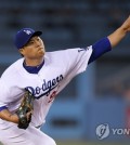 In this Associated Press photo, Ryu Hyun-jin of the Los Angeles Dodgers throws a pitch against the Arizona Diamondbacks at Dodger Stadium in Los Angeles on Sept. 5, 2017. (Yonhap)