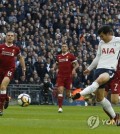 In this photo taken by the Associated Press, Tottenham Hotspur's South Korean forward Son Heung-min (R) scores his club's second goal against Liverpool during their English Premier League match at Wembley Stadium in London on Oct. 22, 2017. (Yonhap)