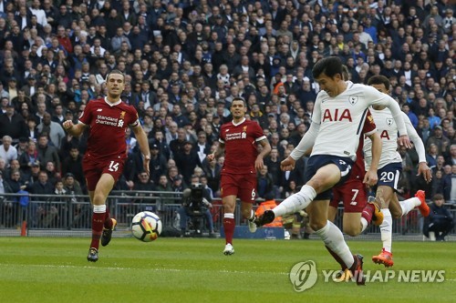 In this photo taken by the Associated Press, Tottenham Hotspur's South Korean forward Son Heung-min (R) scores his club's second goal against Liverpool during their English Premier League match at Wembley Stadium in London on Oct. 22, 2017. (Yonhap)