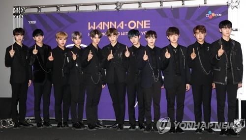 The K-pop project boy group Wanna One poses for photos before a press conference for its repackaged album "1-1=0 Nothing Without You" at the CGV in Yongsan, Seoul, on Nov. 13, 2017. (Yonhap)