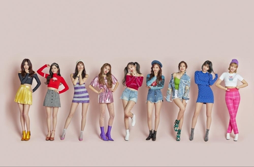 This file publicity photo provided by JYP Entertainment shows K-pop act TWICE. (Yonhap)