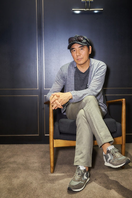 This photo provided by Warner Bros. Korea shows Kim Jee-woon, director of "Illang: The Wolf Brigade." (Yonhap)