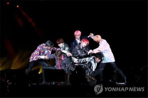 This image shows K-pop band BTS giving a performance. (Yonhap) 