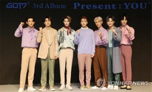 GOT7 members pose for photos during a press conference announcing the release of their new album "Present:YOU" on Sept. 17, 2018. (Yonhap)