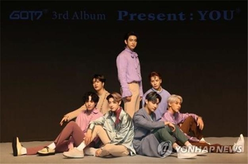 GOT7 members pose for photos during a press conference announcing the release of their new album "Present:YOU" on Sept. 17, 2018. (Yonhap)