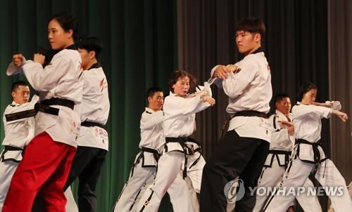 In this file photo, taken April 2, 2018, taekwondo practitioners from South and North Korea perform together at Pyongyang Grand Theatre in Pyongyang. (Yonhap)