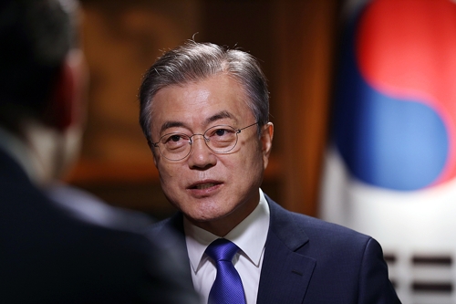 In the photo, provided by South Korea's presidential office Cheong Wa Dae, South Korean President Moon Jae-in is seen holding an interview with a local U.N. news network in New York on Sept. 25, 2018. (Yonhap)