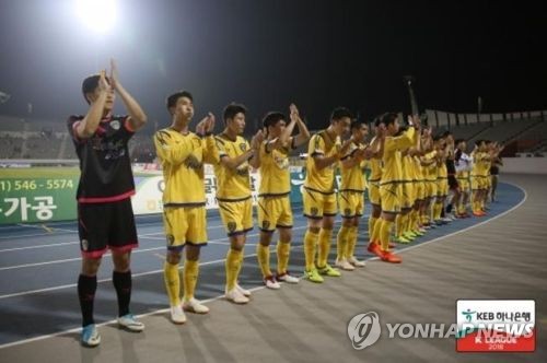 This undated photo provided by the K League shows Asan Mugunghwa FC players. (Yonhap)