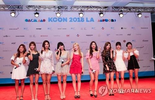 Members of girl group TWICE pose at the annual K-pop festival KCON at the LA Convention Center in Los Angeles on Aug. 11, 2018, in this photo courtesy of CJ ENM. (Yonhap)