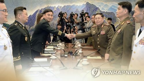 This image, provided by Yonhap News TV, shows South and North Korean officials holding a general-grade meeting at the border truce village of Panmunjom. (Yonhap)