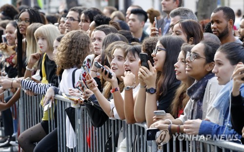 BTS fans wait for the appearance of the K-pop band at a South Korea-France friendship concert in Paris on Oct. 14, 2018. (Yonhap)