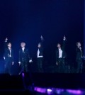 This undated photo provided by Big Hit Entertainment shows the boy band BTS performing at the Tokyo Dome. (Yonhap)