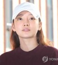 This photo shows Goo Ha-ra appearing at a police station in Seoul for questioning on Sept. 18, 2019. (Yonhap)