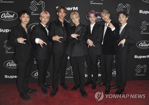 Ten, from left, Baekhyun, Lucas, Taemin, Taeyong, Kai and Mark, of SuperM, attend a media conference on Thursday, Oct. 3, 2019, at Capitol Studios in Los Angeles. (AP) 