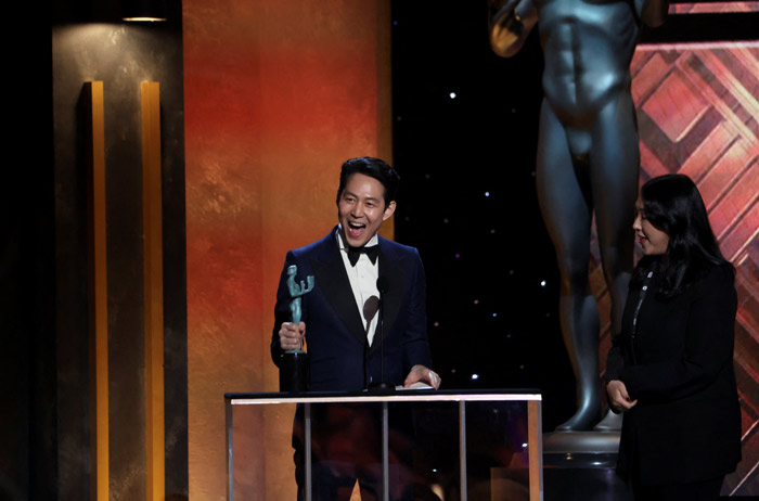 Actor Lee Jung-Jae receives the award for Outstanding Performance by a Male Actor in a Drama Series for "Squid Game" at the 28th Screen Actors Guild Awards, in Santa Monica, California, U.S., February 27, 2022. REUTERS/Mario Anzuoni