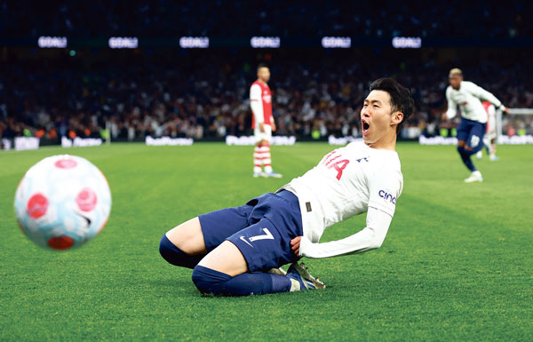 In this Reuters photo, Son Heung-min of Tottenham Hotspur celebrates after scoring a goal against Arsenal during the clubs' Premier League match at Tottenham Hotspur Stadium in London on May 12, 2022