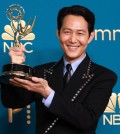 In this Reuters photo, Lee Jung-jae accepts the award for Outstanding Lead Actor In A Drama Series for "Squid Game" at the 74th Primetime Emmy Awards held at the Microsoft Theater in Los Angeles, California, on Sept. 12, 2022. [reuters]