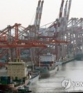 This file photo taken Dec. 9, 2022, shows shipping containers at a pier in South Korea's largest port city of Busan. (Yonhap)