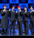 K-pop boy group SF9 poses for the camera during a media showcase for its 12th EP, "The Piece OF9," in Seoul on Jan. 9, 2023, in this photo provided by FNC Entertainment. (PHOTO NOT FOR SALE) (Yonhap)
