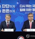 Foreign Minister Park Jin (R) and Defense Minister Lee Jong-sup give a briefing at the government complex in Seoul on Jan. 11, 2023, after making their ministries' policy reports for 2023 to President Yoon Suk Yeol. (Yonhap)