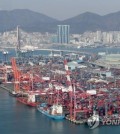 Containers are stacked at a port in the southeastern city of Busan on Feb. 26, 2023. (Yonhap)