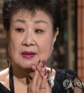 Singer Hyun Mee is seen in this photo provided by local cable TV channel OBS. (PHOTO NOT FOR SALE) (Yonhap)