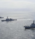 South Korean, U.S., and Japanese warships engage in trilateral missile defense drills in the international waters of the East Sea on April 17, 2023, in this photo released by Seoul's Navy. From right are the South's ROKS Yulgok Yi I, the U.S.' USS Benfold and the Japan Maritime Self-Defense Force's JS Atago. (PHOTO NOT FOR SALE) (Yonhap)