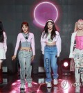 New K-pop girl group Fifty Fifty performs during a press conference in Seoul on April 13, 2023. (Yonhap)