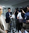 Rep. Choe Kang-wook of the Democratic Party speaks to reporters on June 5, 2023, while a police search was under way at his office at the National Assembly. (Yonhap)
