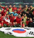 In this file photo from Dec. 2, 2022, South Korean players celebrate their 2-1 win over Portugal in Group H at the FIFA World Cup at Education City Stadium in Al Rayyan, Qatar, to clinch a spot in the round of 16. (Yonhap)
