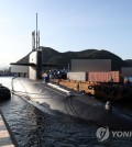 The USS Kentucky, an 18,750-ton Ohio-class nuclear ballistic missile submarine, docks at a naval base in Busan, 320 kilometers southeast of Seoul, on July 19, 2023, in this photo provided by the Korea Defense Daily. (PHOTO NOT FOR SALE) (Yonhap)