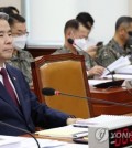 This file photo, taken Aug. 21, 2023, shows Defense Minister Lee Jong-sup (L) attending a session of the National Defense Committee at the National Assembly in western Seoul. (Yonhap)