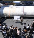 The South Korean military reveals a sunken part of North Korea's ill-fated "Chollima-1" rocket at the Navy's 2nd Fleet Command in Pyeongtaek on South Korea's west coast on June 16, 2023, after salvaging it from the Yellow Sea the previous day following the crash on May 31 of the rocket carrying a military reconnaissance satellite into the sea. (Pool photo) (Yonhap)