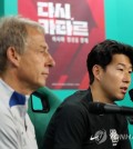 In this file photo from June 19, 2023, South Korean captain Son Heung-min (R) speaks at a press conference before a friendly match against El Salvador, alongside his head coach, Jurgen Klinsmann, at Daejeon World Cup Stadium in the central city of Daejeon. (Yonhap)